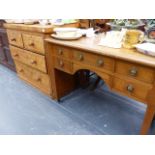 A SATIN BIRCH CHEST OF DRAWERS AND AN EDWARDIAN SIDE TABLE.