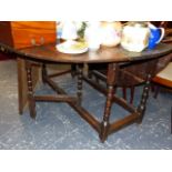 AN 18th.C.OAK COTTAGE GATELEG TABLE.