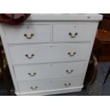 A VICTORIAN PAINTED CHEST OF DRAWERS.