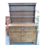 A VINTAGE OAK DRESSER.