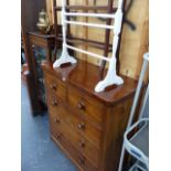 A VICTORIAN MAHOGANY CHEST OF DRAWERS AND TWO TOWEL RAILS.