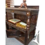 A LARGE ANTIQUE OAK SIDE CABINET.