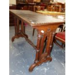 A GOTHIC OAK SIDE TABLE.