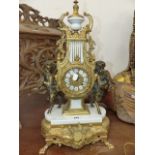 A GILT METAL AND MARBLE LYRE CLOCK SUPPORTED BY BRONZE SATYR CHILDREN, THE MOVEMENT STRIKING ON A
