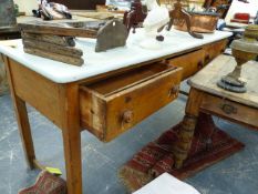 A VICTORIAN PINE SCULLERY DRESSER BASE WITH THREE FRIEZE DRAWERS ON SQUARE LEGS. 218 x 66 x H.