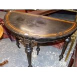 A 19th.C.SATINWOOD INLAID EBONY DEMI LUNE GAMES TABLE, A SMALL DRAWER TO THE BACK FLANKING A CENTRAL