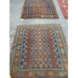 AN UNUSUAL NEAR PAIR OF ANTIQUE PERSIAN RUGS OF CAUCASIAN DESIGN. 164 x 147 & 170 x 147cms.