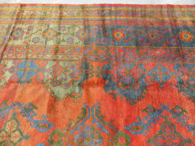 AN ANTIQUE TURKISH OUSHAK CARPET. 402 x 334cms. - Image 6 of 8