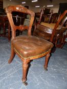 A SET OF EIGHT VICTORIAN WALNUT DINING CHAIRS WITH BUTTON LEATHER UPHOLSTERED SEATS.