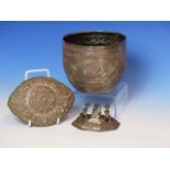 AN ANTIQUE INDIAN BOWL FEATURING INTRICATE REPOUSSE AND CHASED PATTERNS OF ANIMALS AND FIGURES. H.