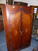 A GEO.III. MAHOGANY WALL HANGING CORNER CABINET WITH TWO SHAPED DOORS FORMING A GOTHIC ARCH,