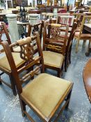 A SET OF SIX ANTIQUE SATIN BIRCH DINING CHAIRS, THE TURNED TOP RAILS ABOVE PIERCED CHIPPENDA