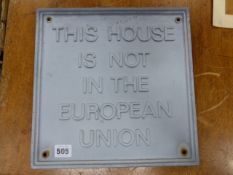 A VINTAGE 1970'S ALLOY WALL PLAQUE, THIS HOUSE IS NOT IN THE EUROPEAN UNION. 30 x 30cms.