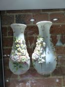 A PAIR OF ENGLISH 19th.C.FLORAL ENCRUSTED VASES.