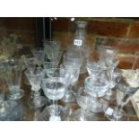 A COLLECTION OF GLASSES AND A DECANTER TO INCLUDE RUMMERS, FLUTES AND ILLUSION GLASSES. (20)
