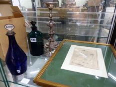 A BLUE GLASS BRANDY DECANTER, AN OCTAGONAL GREEN GLASS DECANTER, A SILVER PLATED PRICKET CANDLESTICK