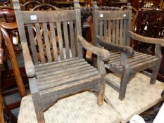 A PAIR OF GOOD QUALITY TEAK CHILD SIZE GARDEN ARMCHAIRS OF TRADITIONAL FORM, CONSTRUCTED FROM THE