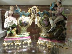 A PAIR OF JACOB PETIT PORCELAIN SPILL VASE GROUPS, THE GENTLEMAN AND LADY SEATED ON GRASSY KNOLLS