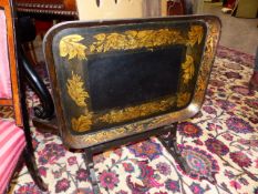 AN EARLY 19th.C.PAPIER MACHE TRAY, SWIVEL MOUNTED AS A TABLE AND/OR SCREEN, THE RECTANGULAR SHAPE
