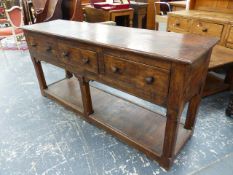 A BESPOKE OAK DRESSER BASE, APRON DRAWERS OVER POTBOARD BASE. W.182 x H.86cms.