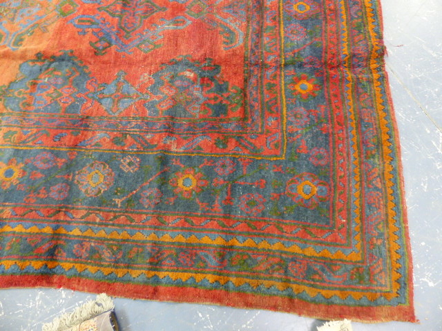 AN ANTIQUE TURKISH OUSHAK CARPET. 402 x 334cms. - Image 4 of 8