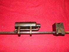 AN ANTIQUE WROUGHT IRON POACHER'S ALARM.