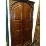 AN 18th.C.PAIR OF PANEL OAK ARCH TOP CABINET DOORS IN ORIGINAL FRAME. 104 x 195cms.