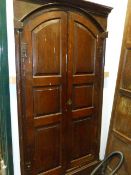 AN 18th.C.PAIR OF PANEL OAK ARCH TOP CABINET DOORS IN ORIGINAL FRAME. 104 x 195cms.