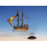 A DUTCH SILVER MINIATURE TWO MASTED SHIP UNDER SAIL WITH ENGLISH IMPORT MARKS. H.14cms TOGETHER WITH