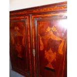 A DUTCH MARQUETRY MAHOGANY FLOOR STANDING CORNER CUPBOARD, THE FOUR DOORS INLAID