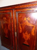A DUTCH MARQUETRY MAHOGANY FLOOR STANDING CORNER CUPBOARD, THE FOUR DOORS INLAID