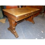 A VICTORIAN AESTHETIC OAK AND EBONY INLAID TWO DRAWER WRITING TABLE. 122 x 57 x H.74cms.