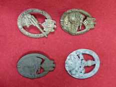 TWO THIRD REICH TANK BATTLE BADGES, PARTISAN BADGE AND AN ANTI-AIRCRAFT BADGE. (4)