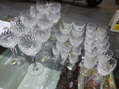 A COLLECTION OF WATERFORD CUT CRYSTAL GLASSWARE TO INCLUDE TEN HOCKS, SIX LIQUEURS, SIX SHERRY AND