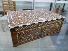 AN INDIAN IVORY FLORAL INLAID BOX, THE HINGED RECTANGULAR LID EDGED IN EBONY ALTERNATING WITH