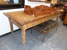 A LATE 19th.C.PINE LARGE SCULLERY TABLE WITH HEAVY PLANK TOP OVER THREE FRIEZE DRAWERS ON TURNED