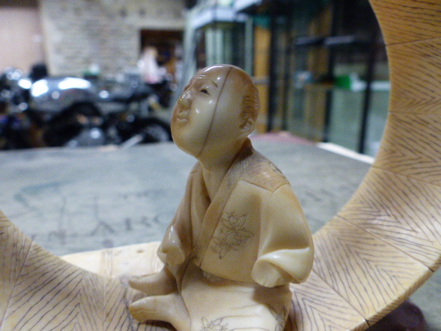 A JAPANESE IVORY FIGURE SEATED WITHIN AN UNFINISHED COOPERED TUB ON IT'S SIDE. H.12cms. - Image 8 of 10