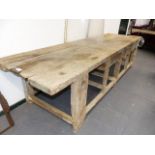 AN ANTIQUE RUSTIC PINE LARGE WORKBENCH. W.336cms.