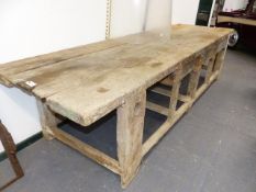 AN ANTIQUE RUSTIC PINE LARGE WORKBENCH. W.336cms.