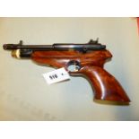 A RARE TITAN PRECHARGE AIR PISTOL WITH WALNUT SHAPED GRIP (NVN)
