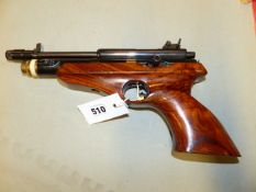 A RARE TITAN PRECHARGE AIR PISTOL WITH WALNUT SHAPED GRIP (NVN)
