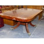 AN EARLY 19th.C. CROSS BANDED MAHOGANY BREAKFAST TABLE, THE ROUNDED RECTANGULAR TOP ON BALUSTER