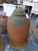 A TERRACOTTA BELL SHAPED RHUBARB FORCER AND COVER STAMPED WYCHFORD POTTERIES. H.69cms.