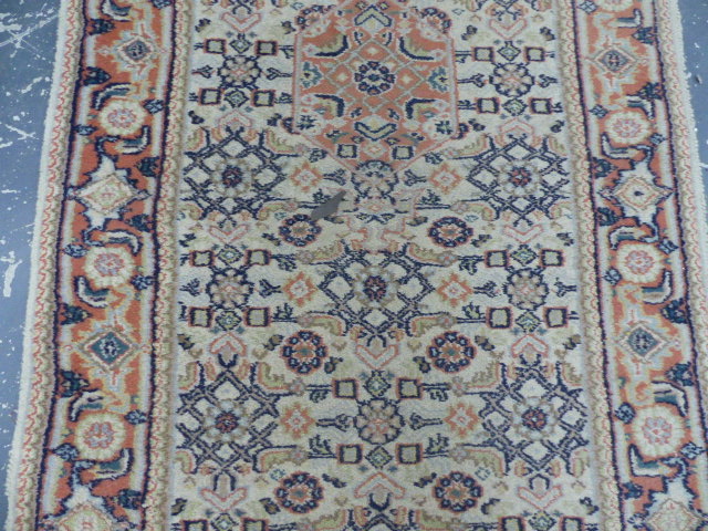 AN ORIENTAL RUNNER OF PERSIAN TABRIZ DESIGN. 332 x 79cms. - Image 3 of 8