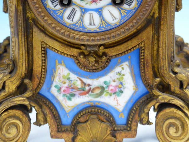 A GILT METAL AND SEVRES PORCELAIN CASED JAPY FRERES CLOCK STRIKING ON A BELL. H.35cms. - Image 4 of 10