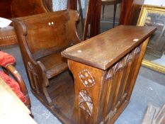 AN OAK COMBINED PEW AND WRITING SLOPE DESK RAISED ON RECTANGULAR PLINTH BASE. 75 x 102 x H.95cms