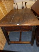 AN 18th.C.OAK REFECTORY TABLE ON SQUARE SECTION LEGS UNITED BY STRETCHER, UNUSUALLY WITH GUIDED