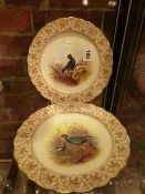 A PAIR OF ROYAL WORCESTER PLATES, DATE CODES FOR 1901, THE INTERIORS PAINTED WITH BLACK GAME AND