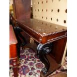 A 19th.C.AND LATER ROSEWOOD CONSOLE TABLE ON EBONISED SCROLL SUPPORTS AND PLATFORM BASE. 112 x 54