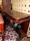 A 19th.C.AND LATER ROSEWOOD CONSOLE TABLE ON EBONISED SCROLL SUPPORTS AND PLATFORM BASE. 112 x 54